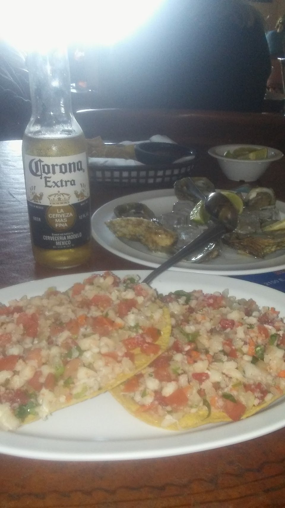 Ceviche tostadas and mojarra dishes listed.