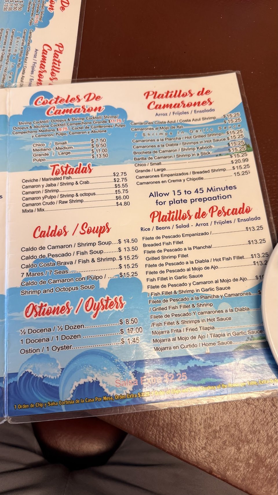 Ceviche tostadas and mojarra dishes listed.